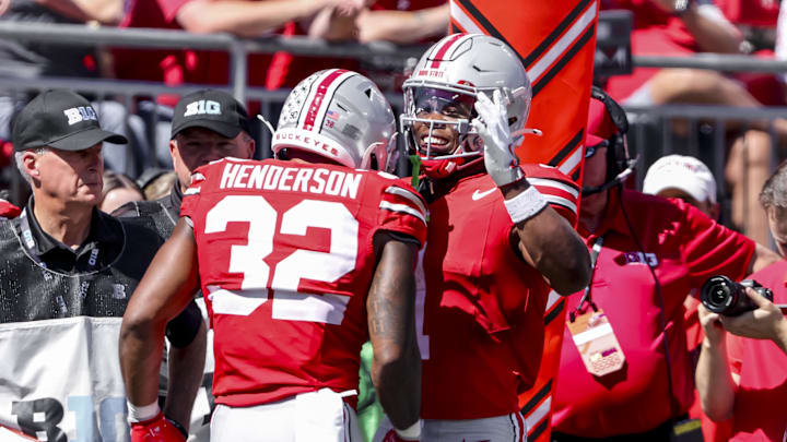 Sep 21, 2024; Columbus, Ohio, USA; Ohio State Buckeyes running back TreVeyon Henderson (32) celebrates the touchdown with running back Quinshon Judkins (1) during the second quarter against the Marshall Thundering Herd at Ohio Stadium. Mandatory Credit: Joseph Maiorana-Imagn Images