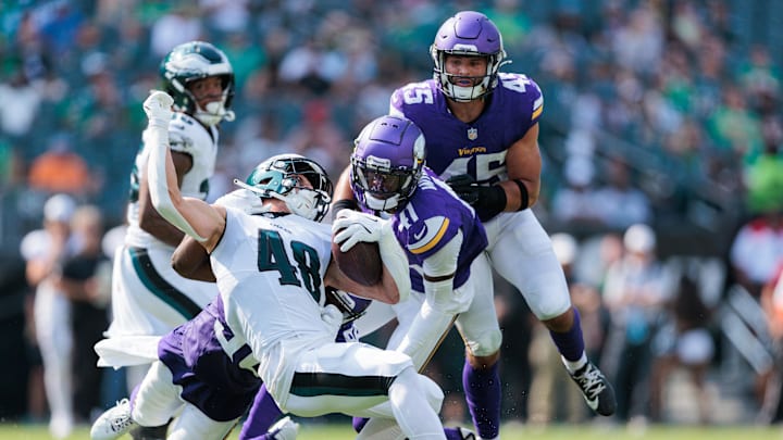 Philadelphia Eagles wide receiver Griffin Hebert (48) is tackled by Minnesota Vikings linebacker Dallas Gant (96).