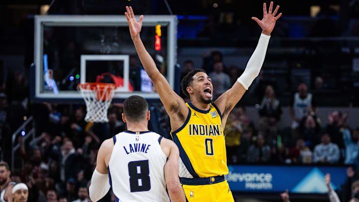 Mar 31, 2025; Indianapolis, Indiana, USA; Indiana Pacers guard Tyrese Haliburton (0) celebrates the game winning basket in the second half against the Sacramento Kings at Gainbridge Fieldhouse. Mandatory Credit: Trevor Ruszkowski-Imagn Images