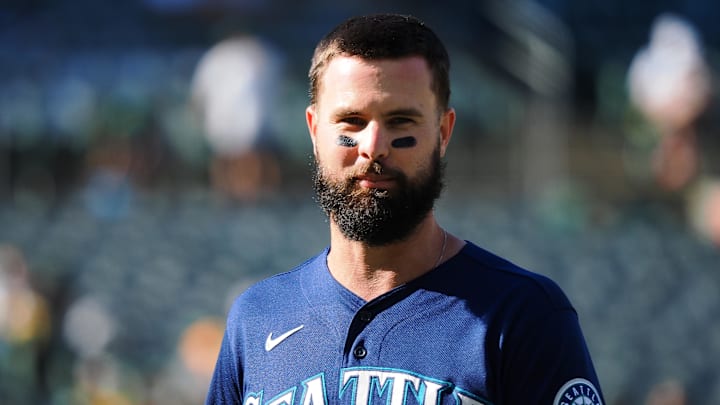 Seattle Mariners left fielder Jesse Winker (27) returns to the dugout after the top of the third inning against the Oakland Athletics at RingCentral Coliseum in 2022. Seattle Mariners left fielder Jesse Winker (27) returns to the dugout after the top of the third inning against the Oakland Athletics at RingCentral Coliseum in 2022.
