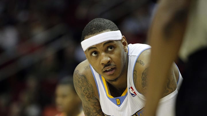 Feb 14, 2011; Houston, TX, USA; Denver Nuggets forward Carmelo Anthony (15) looks at a referee against the Houston Rockets in the second quarter at the Toyota Center. Mandatory Credit: Brett Davis-Imagn Images Feb 14, 2011; Houston, TX, USA; Denver Nuggets forward Carmelo Anthony (15) looks at a referee against the Houston Rockets in the second quarter at the Toyota Center. Mandatory Credit: Brett Davis-Imagn Images
