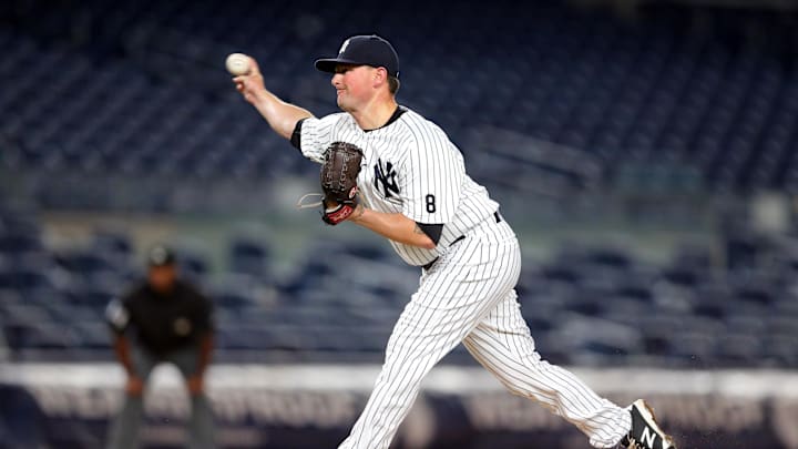 Jun 28, 2016; Bronx, NY, USA; New York Yankees relief pitcher Kirby Yates (39) pitches against the Texas Rangers during the ninth inning at Yankee Stadium. Mandatory Credit: Brad Penner-Imagn Images
