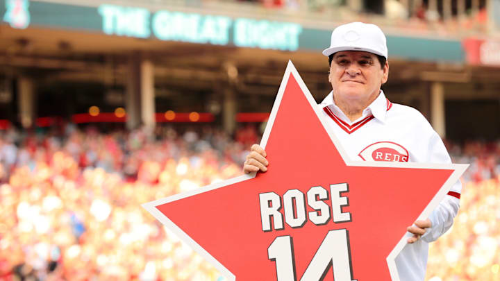Reds great Pete Rose holds a star bearing his name at Great American Ball Park in 2016. Reds great Pete Rose holds a star bearing his name at Great American Ball Park in 2016.
