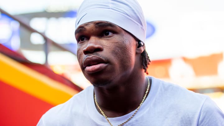 Nov 23, 2024; Kansas City, Missouri, USA;  Colorado wide receiver Travis Hunter (12) prior to the game between the Kansas Jayhawks and the Colorado Buffaloes at GEHA Field at Arrowhead Stadium. Mandatory Credit: Nick Tre. Smith-Imagn Images