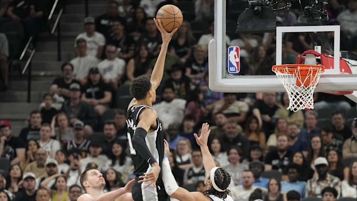 Apr 12, 2024; San Antonio, Texas, USA; San Antonio Spurs forward Victor Wembanyama (1) shoots over