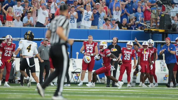 Kansas Jayhawks wide receiver Nik McMillan (5) runs the ball against Missouri Tigers during the game inside David Booth Kansas Memorial Stadium on Sept. 11, 2026. Kansas Jayhawks wide receiver Nik McMillan (5) runs the ball against Missouri Tigers during the game inside David Booth Kansas Memorial Stadium on Sept. 11, 2026.