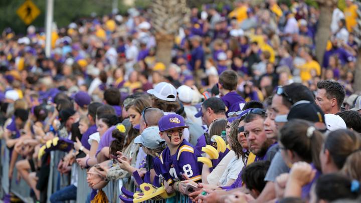 Nov 30, 2019; Baton Rouge, LA, USA; A large crowd awaits the LSU Tigers march down Victory Hill before their game against the Texas A&M Aggies at Tiger Stadium. Mandatory Credit: Chuck Cook-USA TODAY Sports Nov 30, 2019; Baton Rouge, LA, USA; A large crowd awaits the LSU Tigers march down Victory Hill before their game against the Texas A&M Aggies at Tiger Stadium. Mandatory Credit: Chuck Cook-USA TODAY Sports