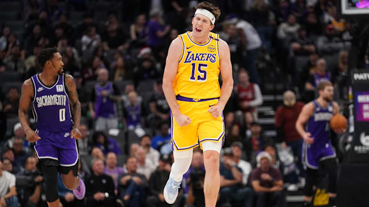 Dec 19, 2024; Sacramento, California, USA; Los Angeles Lakers guard Austin Reaves (15) reacts after making a basket against the Sacramento Kings in the fourth quarter at the Golden 1 Center. Mandatory Credit: Cary Edmondson-Imagn Images