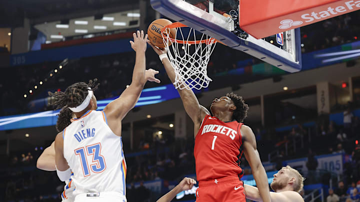 Oct 9, 2024; Oklahoma City, Oklahoma, USA;Houston Rockets forward Amen Thompson (1) shoots against the Oklahoma City Thunder during the second half at Paycom Center. Mandatory Credit: Alonzo Adams-Imagn Images