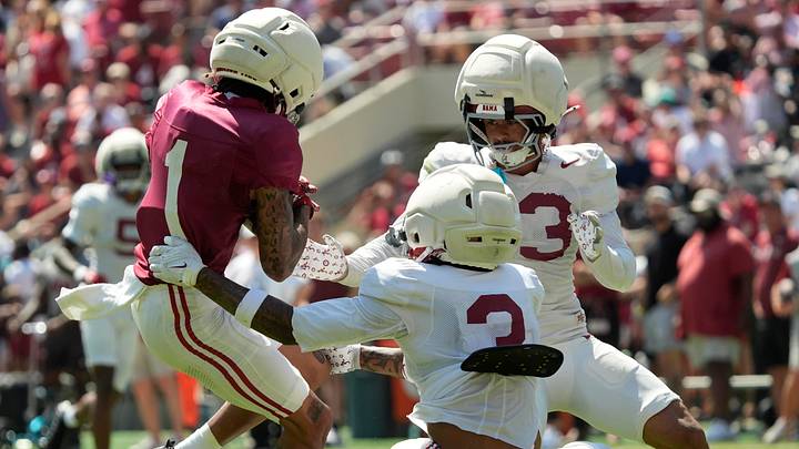April 11, 2026; Tuscaloosa, AL, USA; Alabama Crimson Tide wide receiver Ryan Coleman-Williams (1) makes a catch as he is defended by Alabama Crimson Tide defensive back Keon Sabb (3) and Alabama Crimson Tide defensive back Ivan Taylor (13) at Bryant-Denny Stadium during the Alabama A Day scrimmage. April 11, 2026; Tuscaloosa, AL, USA; Alabama Crimson Tide wide receiver Ryan Coleman-Williams (1) makes a catch as he is defended by Alabama Crimson Tide defensive back Keon Sabb (3) and Alabama Crimson Tide defensive back Ivan Taylor (13) at Bryant-Denny Stadium during the Alabama A Day scrimmage.