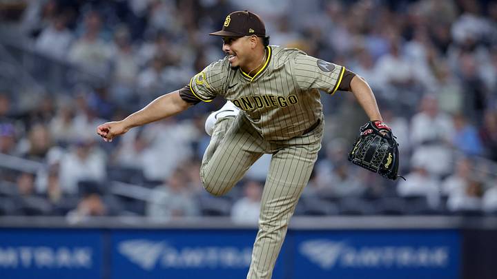 May 7, 2025; Bronx, New York, USA; San Diego Padres relief pitcher Jeremiah Estrada (56) follows through on a pitch against the New York Yankees during the tenth inning at Yankee Stadium. Mandatory Credit: Brad Penner-Imagn Images