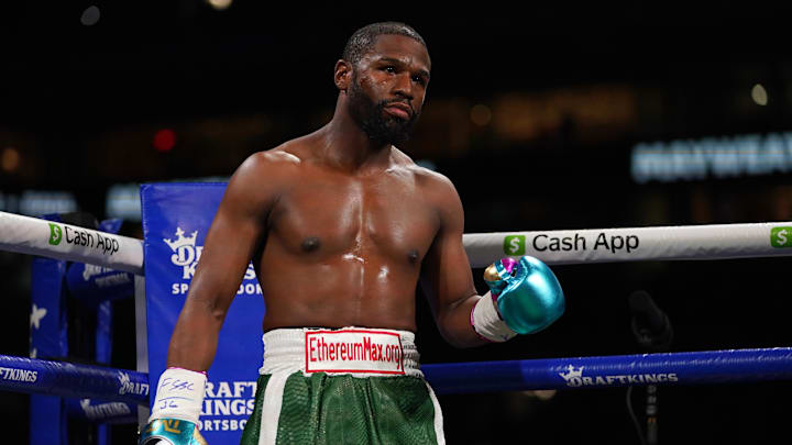 Jun 6, 2021; Miami, Florida, USA; Floyd Mayweather Jr. (Green Trunks) stands in the ring prior to his fight against Logan Paul (not pictured) at Hard Rock Stadium. Mandatory Credit: Jasen Vinlove-Imagn Images