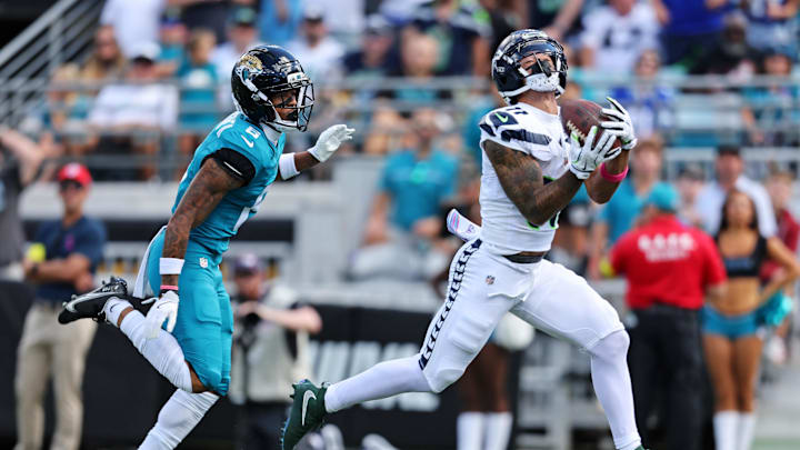 Oct 12, 2025; Jacksonville, Florida, USA; Seattle Seahawks wide receiver Jaxon Smith-Njigba (11) makes a catch to score a touchdown during the first half against the Jacksonville Jaguars at EverBank Stadium. Mandatory Credit: Morgan Tencza-Imagn Images