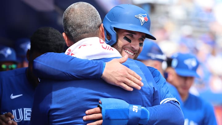 Mar 13, 2023; Dunedin, Florida, USA;  Toronto Blue Jays center fielder Kevin Kiermaier (39) smiles