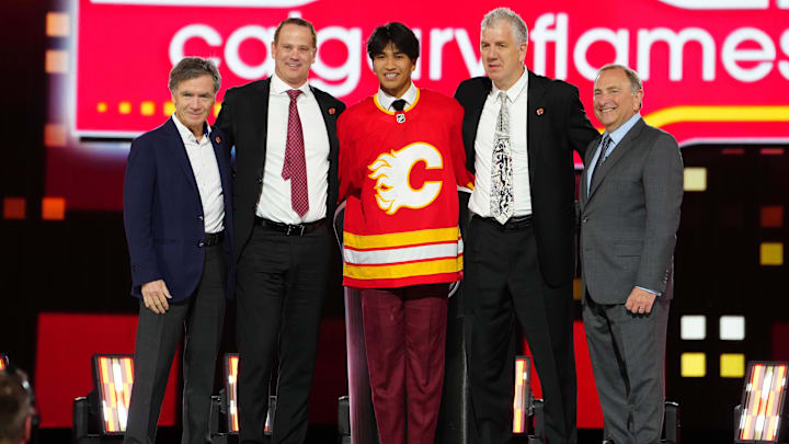 Jun 28, 2024; Las Vegas, Nevada, USA; Zayne Parekh is selected by the Calgary Flames with the 9th overall pick in the first round of the 2024 NHL Draft at The Sphere. Mandatory Credit: Stephen R. Sylvanie-Imagn Images