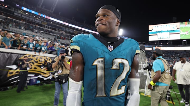 Oct 6, 2025; Jacksonville, Florida, USA; Jacksonville Jaguars wide receiver Travis Hunter (12) reacts after defeating the Kansas City Chiefs at EverBank Stadium. Mandatory Credit: Nathan Ray Seebeck-Imagn Images