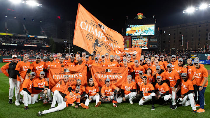 Boston Red Sox v Baltimore Orioles: The Orioles pose on the field after winning the AL East by beating the Boston Red Sox