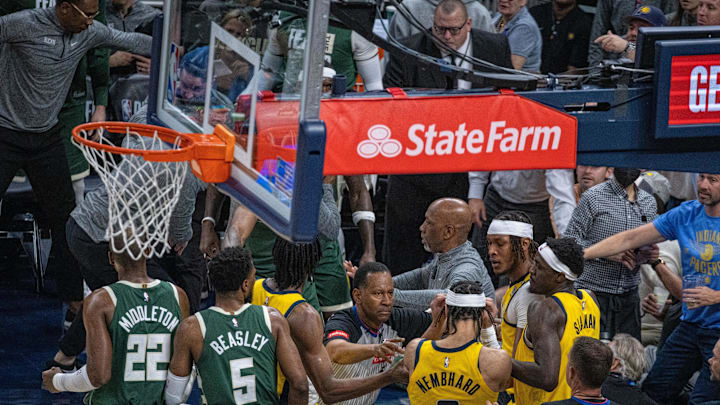Apr 28, 2024; Indianapolis, Indiana, USA; Indiana Pacers guard Andrew Nembhard (2) and Milwaukee