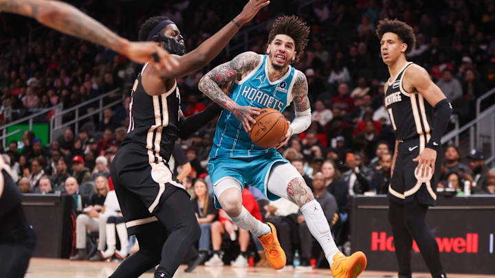 Feb 7, 2026; Atlanta, Georgia, USA; Charlotte Hornets guard LaMelo Ball (1) drives to the basket against the Atlanta Hawks in the fourth quarter at State Farm Arena. Mandatory Credit: Brett Davis-Imagn Images