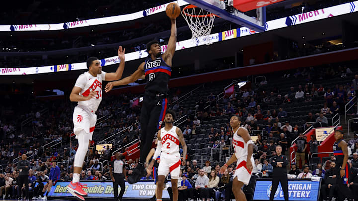 Mar 13, 2024; Detroit, Michigan, USA; Detroit Pistons center James Wiseman (13) dunks on Toronto Raptors center Jontay Porter (34) in the first half at Little Caesars Arena. Mandatory Credit: Rick Osentoski-Imagn Images Mar 13, 2024; Detroit, Michigan, USA; Detroit Pistons center James Wiseman (13) dunks on Toronto Raptors center Jontay Porter (34) in the first half at Little Caesars Arena. Mandatory Credit: Rick Osentoski-Imagn Images
