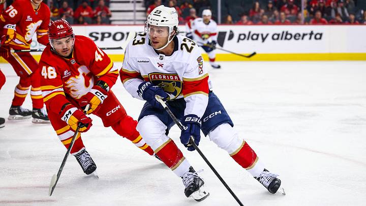 Mar 20, 2026; Calgary, Alberta, CAN; Florida Panthers center Carter Verhaeghe (23) skates with the puck against the Calgary Flames during the first period at Scotiabank Saddledome. Mandatory Credit: Sergei Belski-Imagn Images Mar 20, 2026; Calgary, Alberta, CAN; Florida Panthers center Carter Verhaeghe (23) skates with the puck against the Calgary Flames during the first period at Scotiabank Saddledome. Mandatory Credit: Sergei Belski-Imagn Images