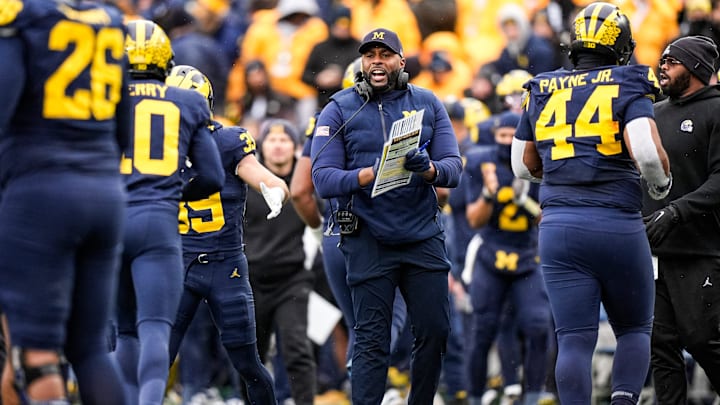Michigan head coach Sherrone Moore cheers on at a timeout against Ohio State during the first half at Michigan Stadium in Ann Arbor on Saturday, Nov. 29, 2025.