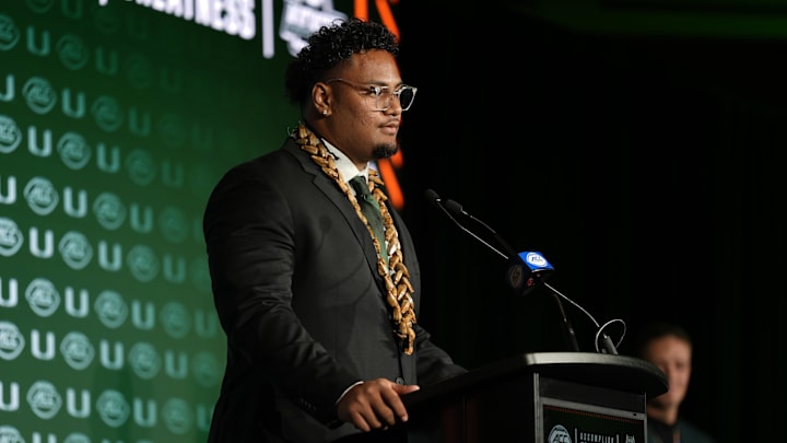 Jul 22, 2025; Charlotte, NC, USA; Miami offensive lineman Francis Mauigoa, Jr answers questions from the media during ACC Media Days at Hilton Charlotte Uptown. Mandatory Credit: Jim Dedmon-Imagn Images