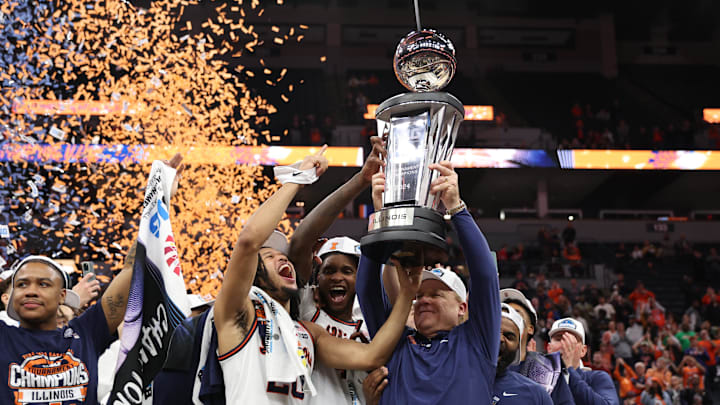 Mar 17, 2024; Minneapolis, MN, USA; Illinois Fighting Illini  head coach Brad Underwood celebrates with forward Ty Rodgers (20) after defeating Wisconsin Badgers at Target Center. Mandatory Credit: Matt Krohn-Imagn Images