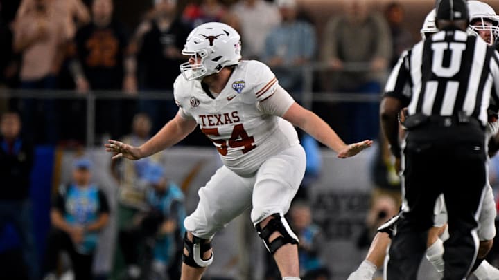Jan 10, 2025; Arlington, TX, USA; Texas Longhorns offensive lineman Cole Hutson (54) in action during the game between the Texas Longhorns and the Ohio State Buckeyes at AT&T Stadium. Mandatory Credit: Jerome Miron-Imagn Images