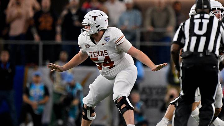 Jan 10, 2025; Arlington, TX, USA; Texas Longhorns offensive lineman Cole Hutson (54) in action during the game between the Texas Longhorns and the Ohio State Buckeyes at AT&T Stadium. Mandatory Credit: Jerome Miron-Imagn Images