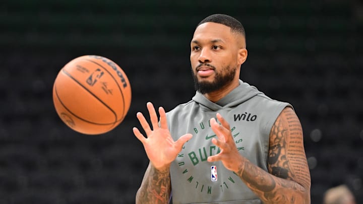 Oct 14, 2024; Milwaukee, Wisconsin, USA;  Milwaukee Bucks guard Damian Lillard (0) warms up before game against the Chicago Bulls at Fiserv Forum. Mandatory Credit: Benny Sieu-Imagn Images