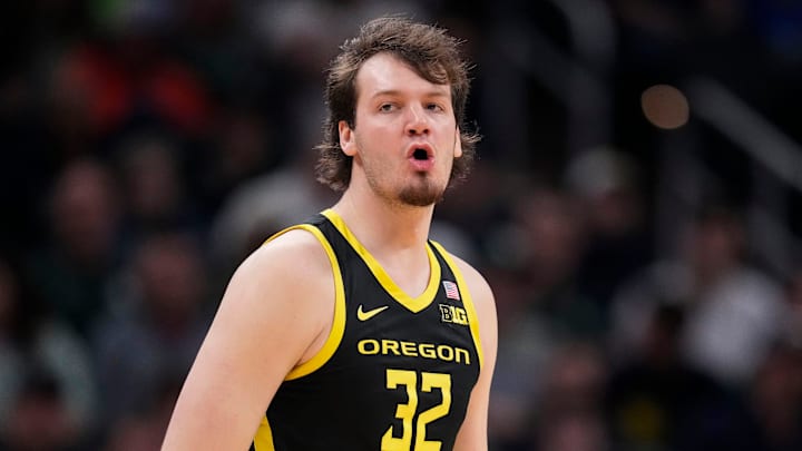 Oregon Ducks center Nate Bittle (32) yells in excitement Friday, March 14, 2025, during the third round of the men's Big Ten tournament at Gainbridge Fieldhouse in Indianapolis.