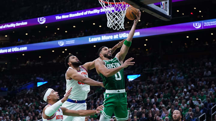 Oct 22, 2024; Boston, Massachusetts, USA; Boston Celtics forward Jayson Tatum (0) drives to the basket against New York Knicks center Karl-Anthony Towns (32) in the second quarter at TD Garden. Mandatory Credit: David Butler II-Imagn Images Oct 22, 2024; Boston, Massachusetts, USA; Boston Celtics forward Jayson Tatum (0) drives to the basket against New York Knicks center Karl-Anthony Towns (32) in the second quarter at TD Garden. Mandatory Credit: David Butler II-Imagn Images