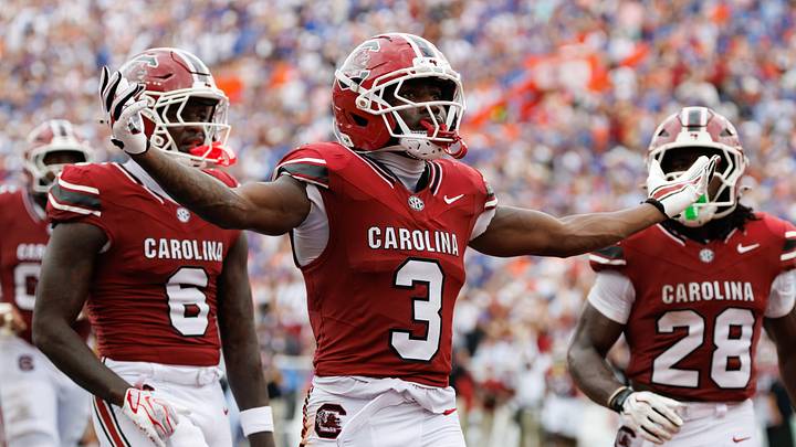 Oct 10, 2026; Gainesville, Florida, USA; South Carolina Gamecocks wide receiver Mazeo Bennett Jr. (3) gestures after scoring a touchdown with South Carolina Gamecocks wide receiver Donovan Murph (6) and South Carolina Gamecocks running back Matt Fuller (28) against the Florida Gators during the first half at Ben Hill Griffin Stadium. Mandatory Credit: Matt Pendleton-Imagn Images Oct 10, 2026; Gainesville, Florida, USA; South Carolina Gamecocks wide receiver Mazeo Bennett Jr. (3) gestures after scoring a touchdown with South Carolina Gamecocks wide receiver Donovan Murph (6) and South Carolina Gamecocks running back Matt Fuller (28) against the Florida Gators during the first half at Ben Hill Griffin Stadium. Mandatory Credit: Matt Pendleton-Imagn Images