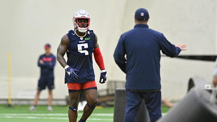 Jun 10, 2025; Foxborough, MA, USA; New England Patriots safety Jabrill Peppers (5) works with a member of the coaching staff during minicamp held in the WIN Field House at Gillette Stadium. Mandatory Credit: Eric Canha-Imagn Images