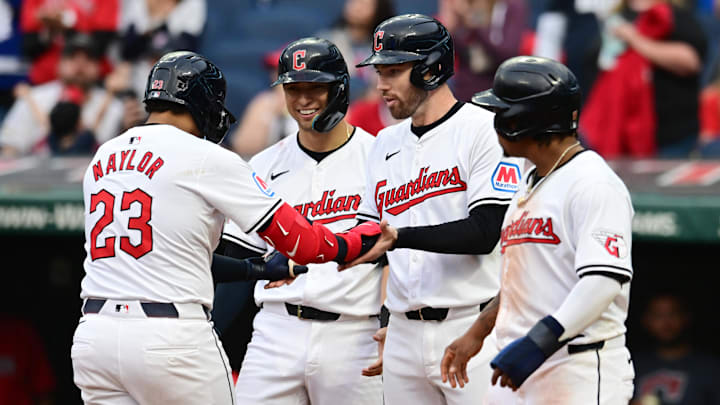 May 4, 2024; Cleveland, Ohio, USA; Cleveland Guardians designated hitter Bo Naylor (23) celebrates with center fielder Tyler Freeman, middle left, and first baseman David Fry, middle right, and third baseman Jose Ramirez (11) after hitting a grand slam home run during the sixth inning against the Los Angeles Angels at Progressive Field. Mandatory Credit: Ken Blaze-USA TODAY Sports May 4, 2024; Cleveland, Ohio, USA; Cleveland Guardians designated hitter Bo Naylor (23) celebrates with center fielder Tyler Freeman, middle left, and first baseman David Fry, middle right, and third baseman Jose Ramirez (11) after hitting a grand slam home run during the sixth inning against the Los Angeles Angels at Progressive Field. Mandatory Credit: Ken Blaze-USA TODAY Sports