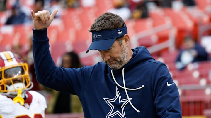 Dec 25, 2025; Landover, Maryland, USA; Dallas Cowboys head coach Brian Schottenheimer looks on during warmups before the game against the Washington Commanders at Northwest Stadium. Mandatory Credit: Amber Searls-Imagn Images Dec 25, 2025; Landover, Maryland, USA; Dallas Cowboys head coach Brian Schottenheimer looks on during warmups before the game against the Washington Commanders at Northwest Stadium. Mandatory Credit: Amber Searls-Imagn Images