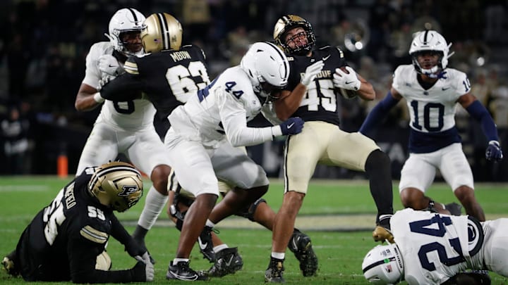 Penn State Nittany Lions defensive end Jaylen Harvey (44) tackles Purdue Boilermakers running back Devin Mockobee (45) Saturday, Nov. 16, 2024, during the NCAA football game at Ross-Ade Stadium in West Lafayette, Ind. Penn State Nittany Lions won 49-10.