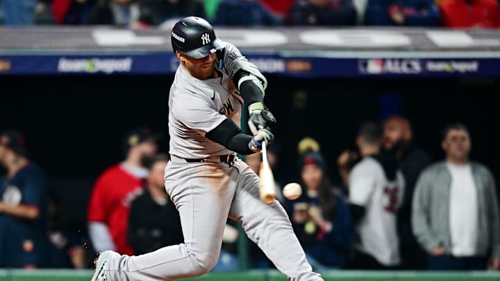 New York Yankees second baseman Gleyber Torres (25) hits a single during the sixth inning against the Cleveland Guardians during game five of the ALCS for the 2024 MLB playoffs at Progressive Field on Oct 19. New York Yankees second baseman Gleyber Torres (25) hits a single during the sixth inning against the Cleveland Guardians during game five of the ALCS for the 2024 MLB playoffs at Progressive Field on Oct 19.