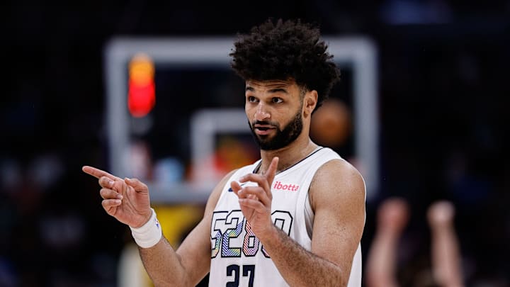 Mar 26, 2025; Denver, Colorado, USA; Denver Nuggets guard Jamal Murray (27) gestures in the third quarter against the Milwaukee Bucks at Ball Arena. Mandatory Credit: Isaiah J. Downing-Imagn Images