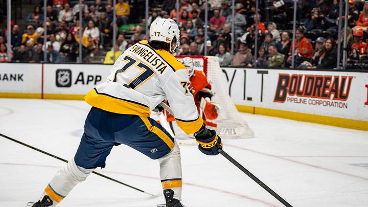 Apr 4, 2026; Anaheim, California, USA; Nashville Predators right wing Luke Evangelista (77) prepares a shot on goal with Anaheim Ducks goaltender Lukas Dostal (1) defending during the first period at Honda Center. Mandatory Credit: Corinne Votaw-Imagn Images Apr 4, 2026; Anaheim, California, USA; Nashville Predators right wing Luke Evangelista (77) prepares a shot on goal with Anaheim Ducks goaltender Lukas Dostal (1) defending during the first period at Honda Center. Mandatory Credit: Corinne Votaw-Imagn Images