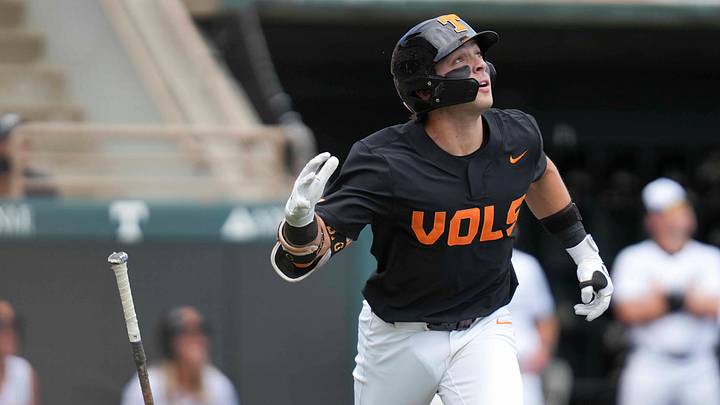 Tennessee infielder Andrew Fischer (11) flips his bat after he hits a home run during an NCAA baseball game between the Tennessee Volunteers and Vanderbilt Commodores at Lindsey Nelson Stadium on May 11, 2025. Tennessee infielder Andrew Fischer (11) flips his bat after he hits a home run during an NCAA baseball game between the Tennessee Volunteers and Vanderbilt Commodores at Lindsey Nelson Stadium on May 11, 2025.