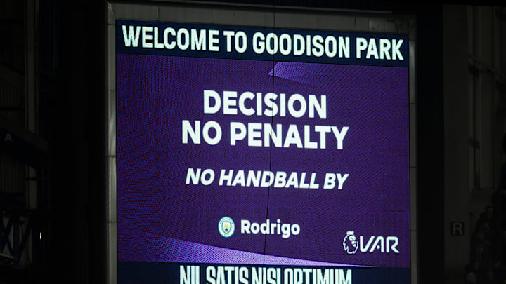 Video assistant referee decisions are signalled on LED boards around the Premier League