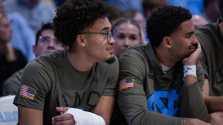Nov 11, 2025; Chapel Hill, North Carolina, USA; North Carolina Tar Heels guard Seth Trimble (7) looks on from the bench after getting injured before the game against the Radford Highlanders at Dean E. Smith Center. 
