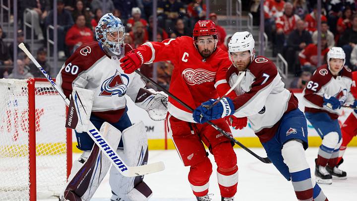Detroit Red Wings center Dylan Larkin (71) and Colorado Avalanche defenseman Devon Toews (7) fight for position Credit: Rick Osentoski-USA TODAY Sports Detroit Red Wings center Dylan Larkin (71) and Colorado Avalanche defenseman Devon Toews (7) fight for position Credit: Rick Osentoski-USA TODAY Sports