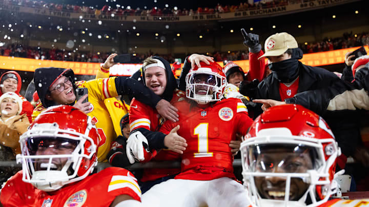 Jan 26, 2025; Kansas City, MO, USA; Kansas City Chiefs wide receiver Xavier Worthy (1) celebrate with fans after a touchdown against the Buffalo Bills during the first half in the AFC Championship game at GEHA Field at Arrowhead Stadium. Mandatory Credit: Mark J. Rebilas-Imagn Images
