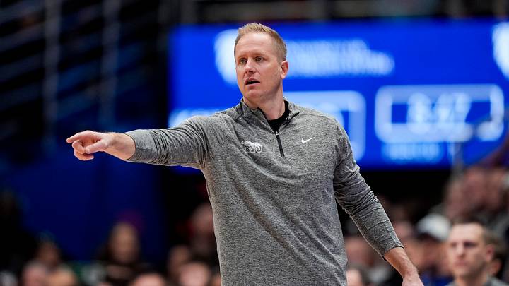 Jan 31, 2026; Lawrence, Kansas, USA; BYU Cougars head coach Kevin Young reacts during the first half against the Kansas Jayhawks at Mizzou Arena. Mandatory Credit: Jay Biggerstaff-Imagn Images