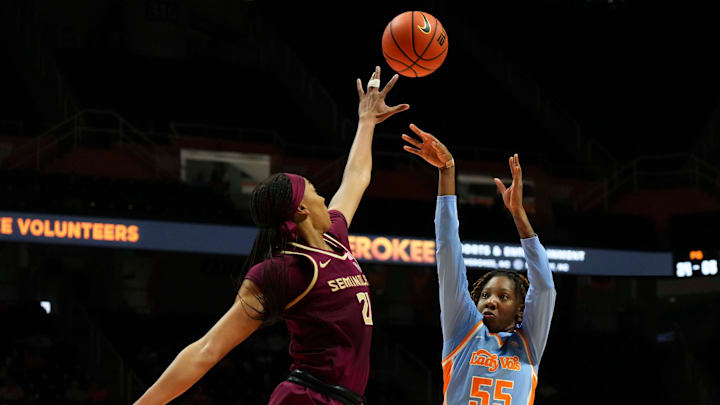 Florida State forward Makayla Timpson (21) tries to block Tennessee guard Talaysia Cooper (55) shot during a college basketball game at Thompson-Boling Arena at Food City Center in Knoxville, Tenn., on Wednesday, Dec. 4, 2024.