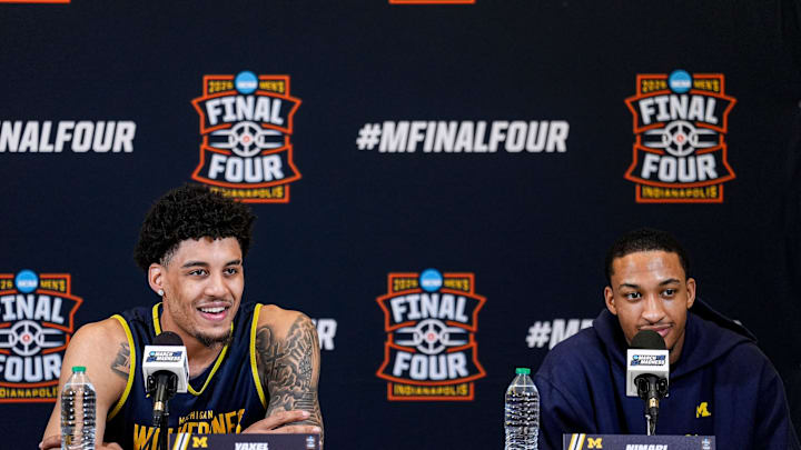 Michigan forward Yaxel Lendeborg (23), left, and guard Nimari Burnett (4) answer questions at break out room ahead of practice at Lucas Oil Stadium in Indianapolis for practice on Friday, April 3, 2026. Michigan forward Yaxel Lendeborg (23), left, and guard Nimari Burnett (4) answer questions at break out room ahead of practice at Lucas Oil Stadium in Indianapolis for practice on Friday, April 3, 2026.