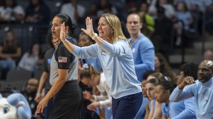 Mar 28, 2025; Birmingham, AL, USA; North Carolina Tar Heels head coach Courtney Banghart signals in to her team during the Sweet 16 NCAA Tournament basketball game against the Duke Blue Devils at Legacy Arena. Mandatory Credit: Vasha Hunt-Imagn Images